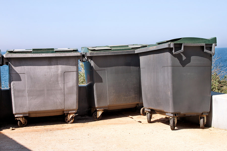 large gray trash cans