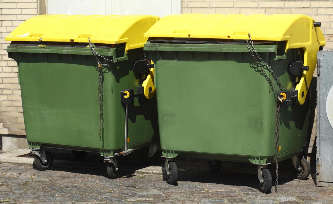 large green trash cans